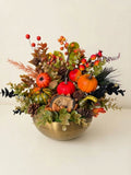 Fall Centerpiece with Sleeping Hedgehog, Colorful Pumpkins, and Pinecones