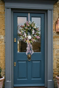 Frosted Winter Wonderland Christmas Wreath: Blush Pink Berries, Angel Ornaments, and Fairy Lights